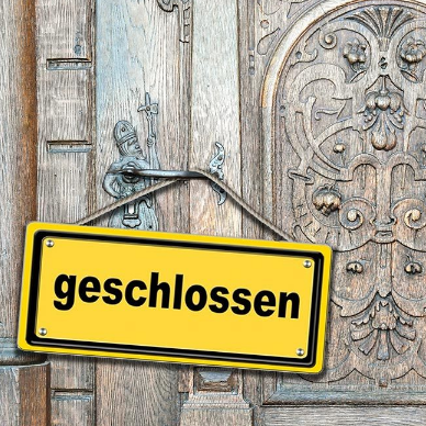 Ein Geschlossen-Schild an der Rathaustüre